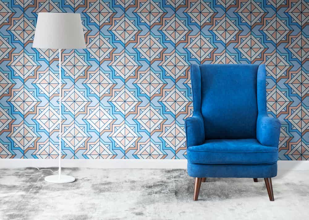Blue chair room with wallpaper on Home Walls